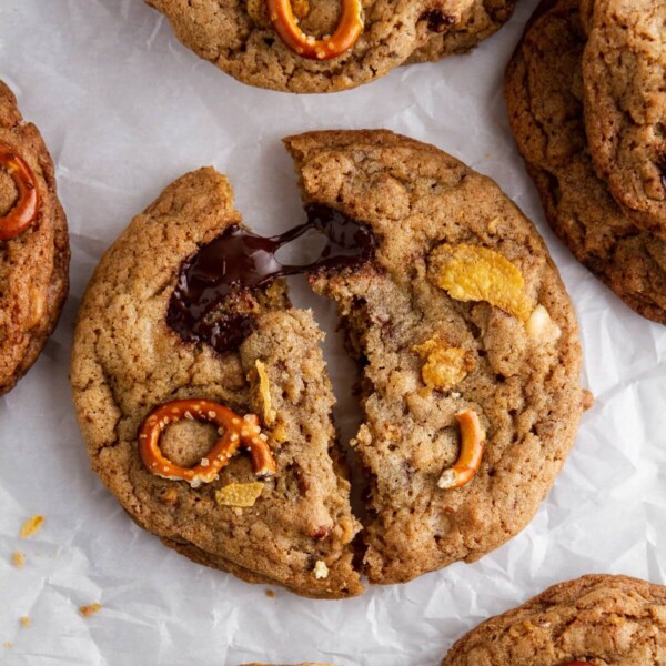 kitchen sink cookie broken open on white parchment.