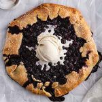 blueberry galette on a surface.