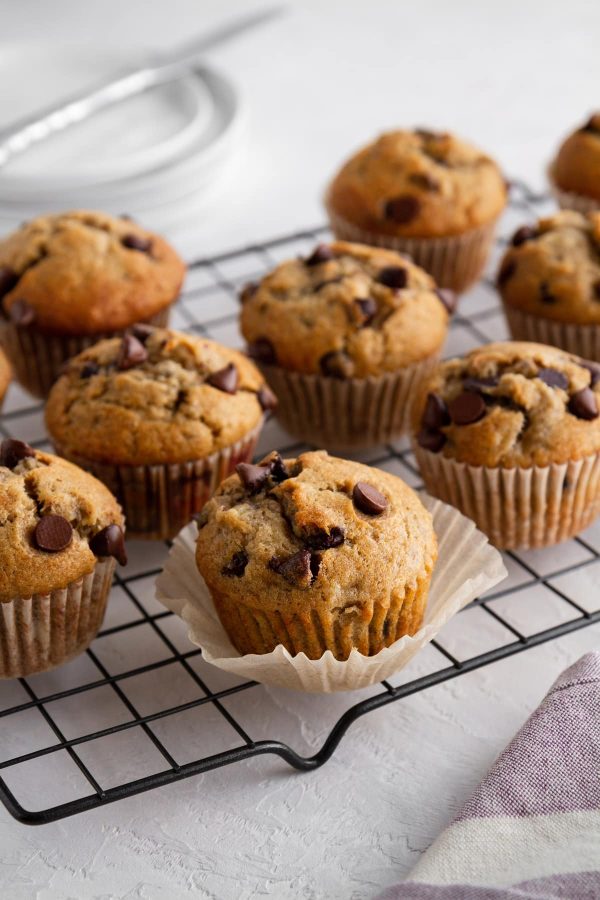 chocolate chip banana muffins on a cooling rack