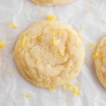 one lemon cookie on parchment.