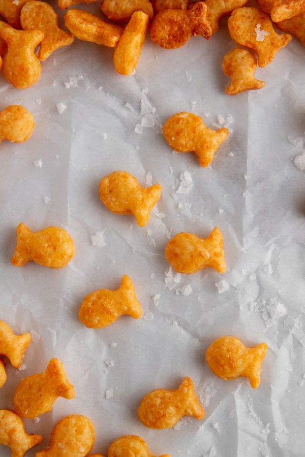 Homemade goldfish crackers on parchment paper