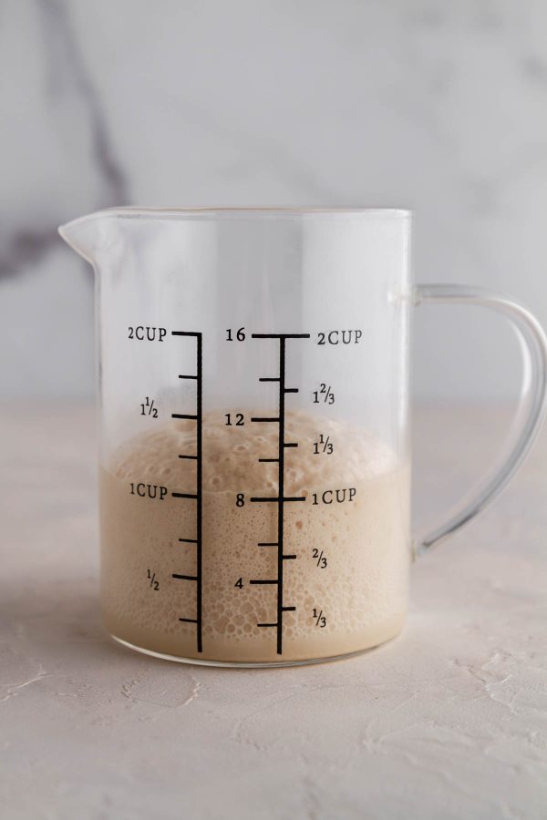 measuring cup with activated yeast