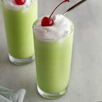 shamrock shakes in glasses on a surface