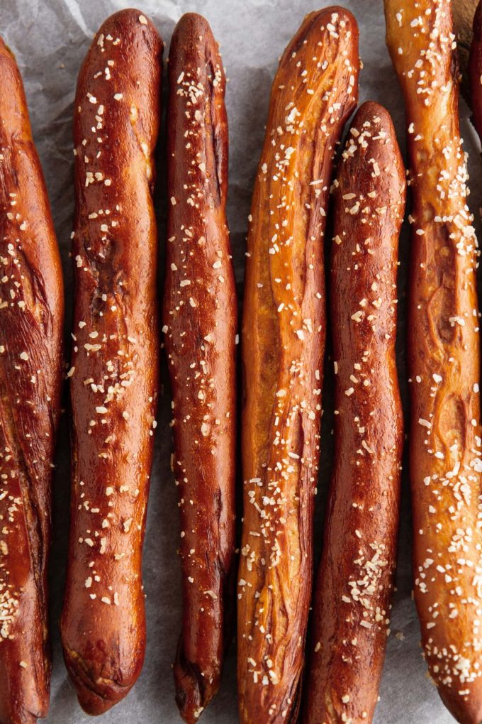 overhead shot of homemade hard pretzel rods in a row