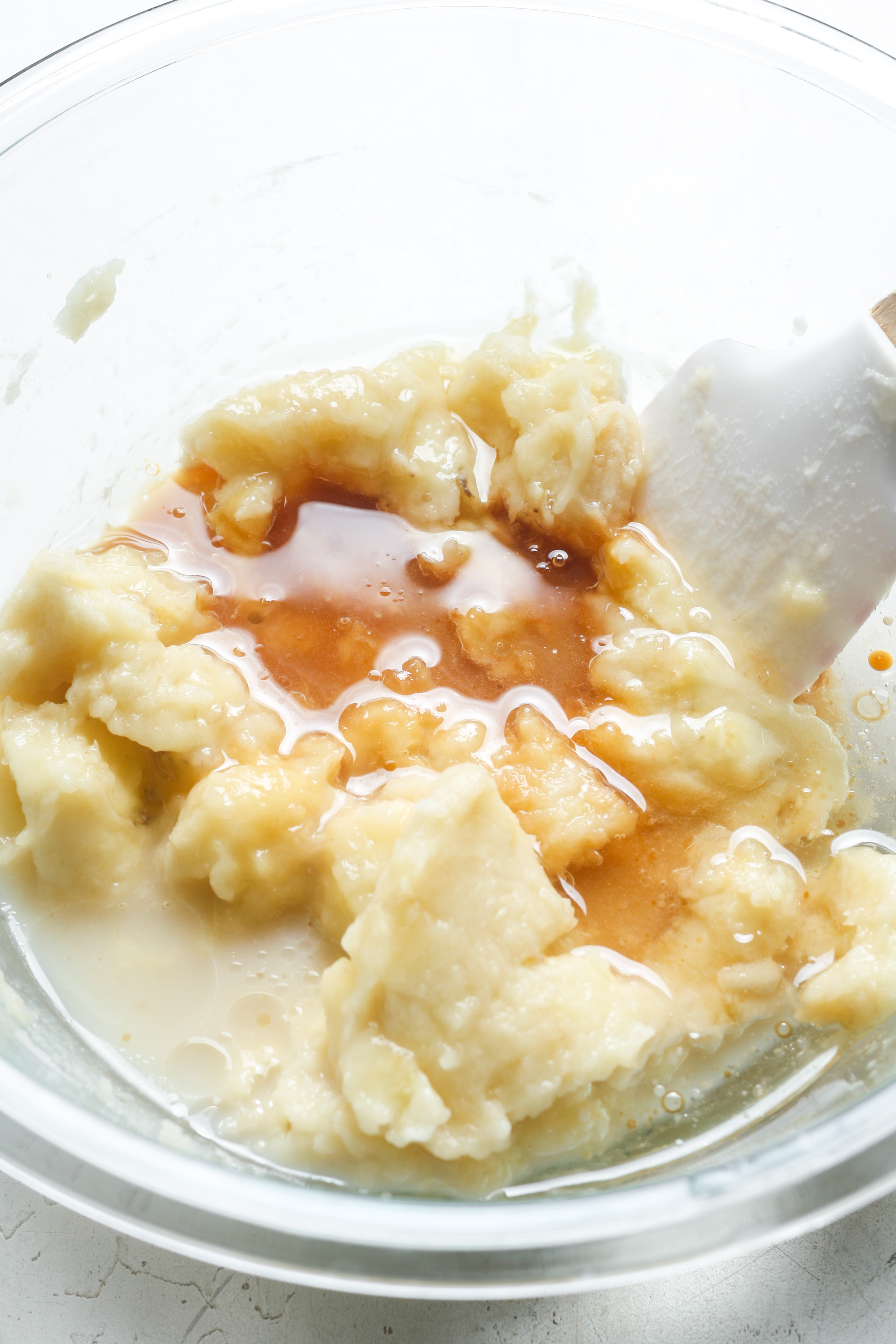 Mashed banana with milk.