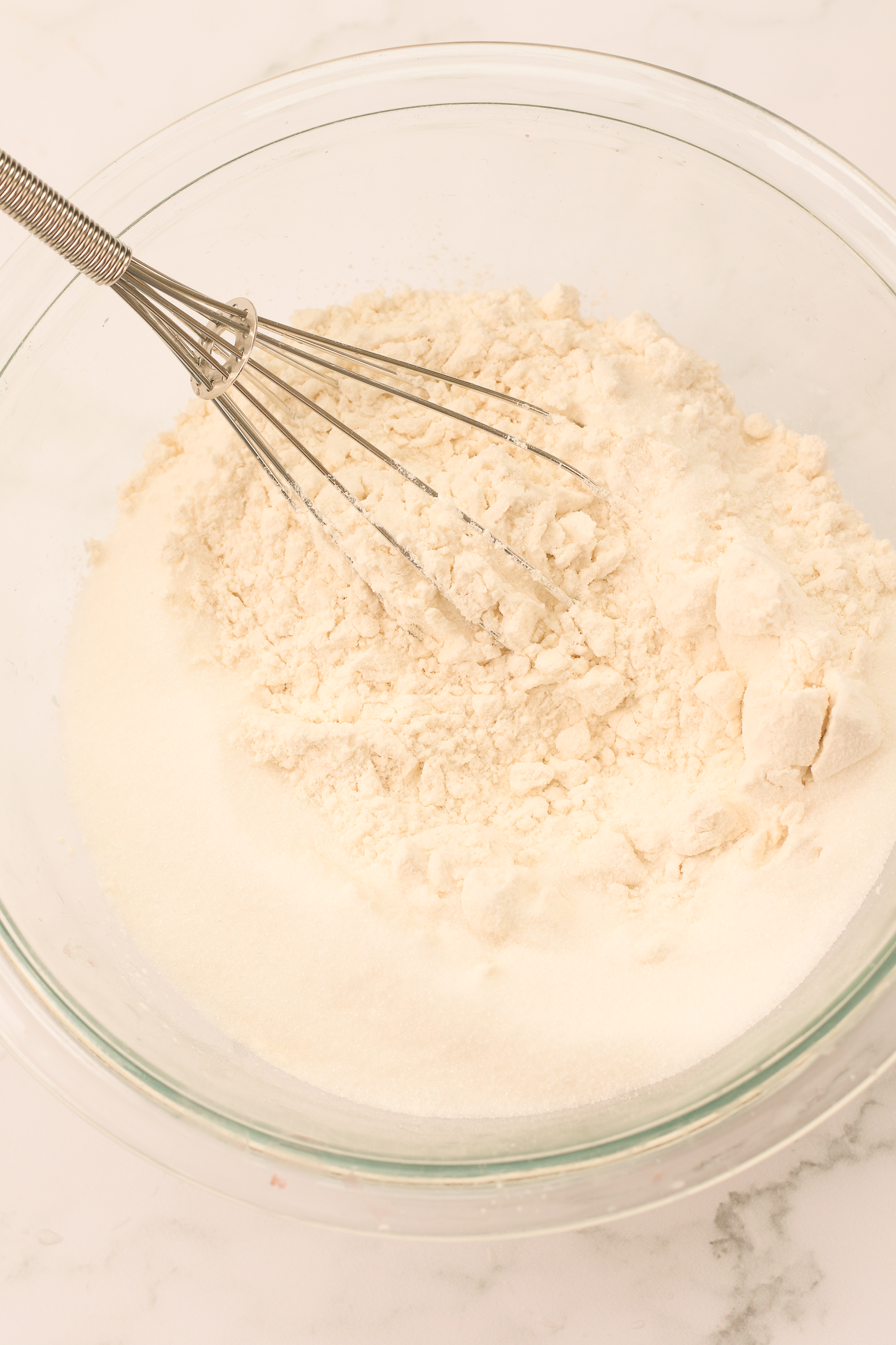Flour and sugar in bowl.