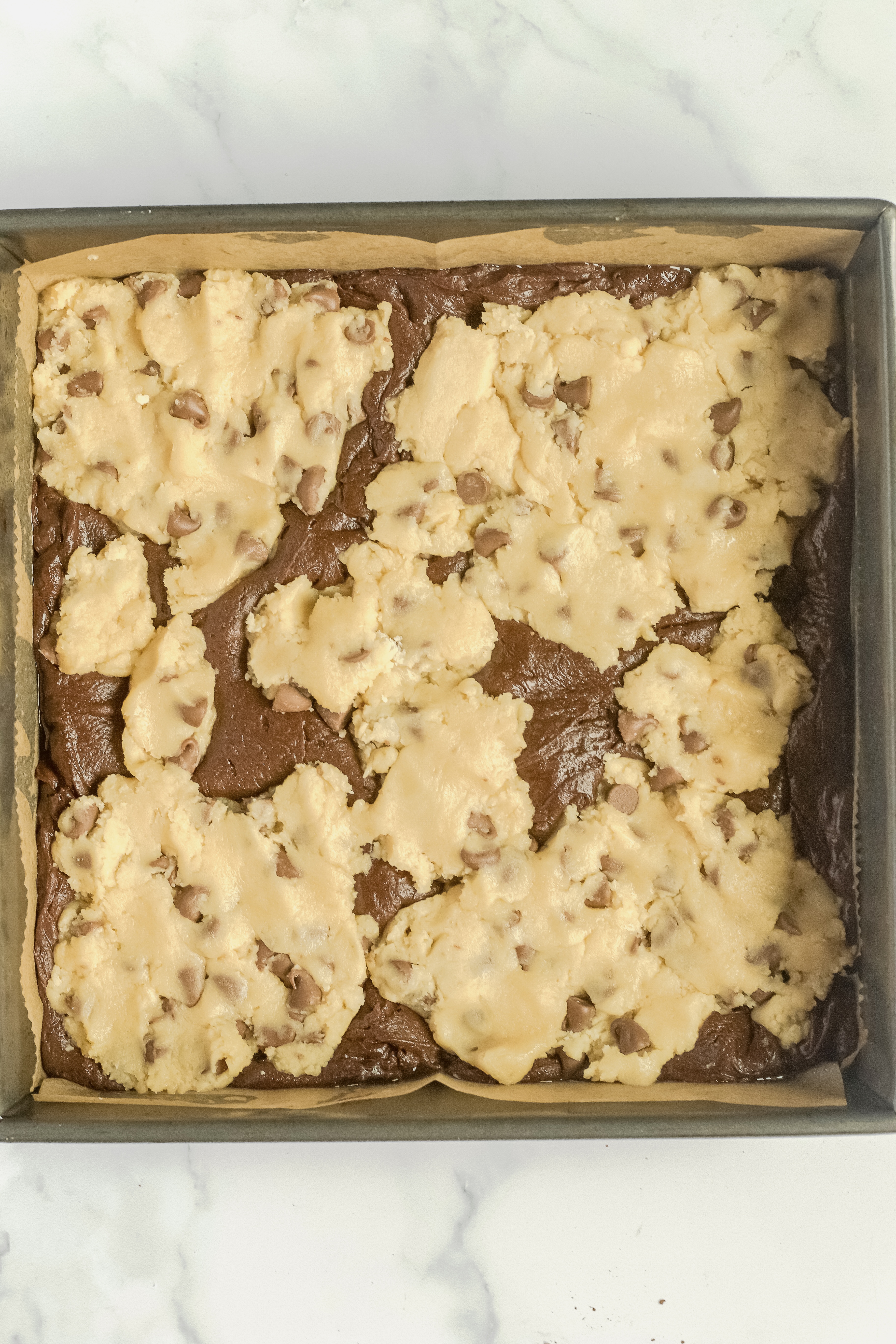 Brookie dough in pan.