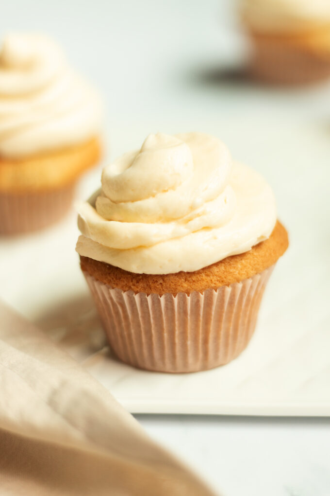 Cupcake with vanilla frosting.