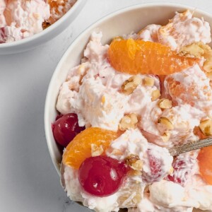 ambrosia salad in white bowl.