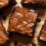 crinkle topped brownie on parchment.