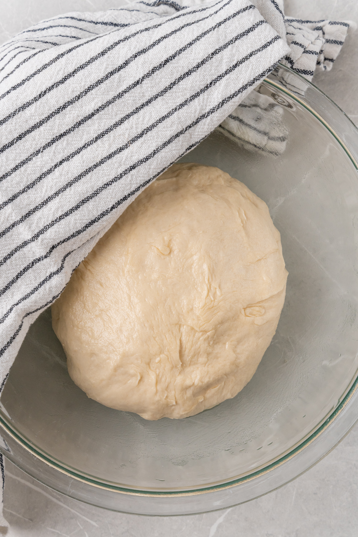 Towel over bowl with batter.