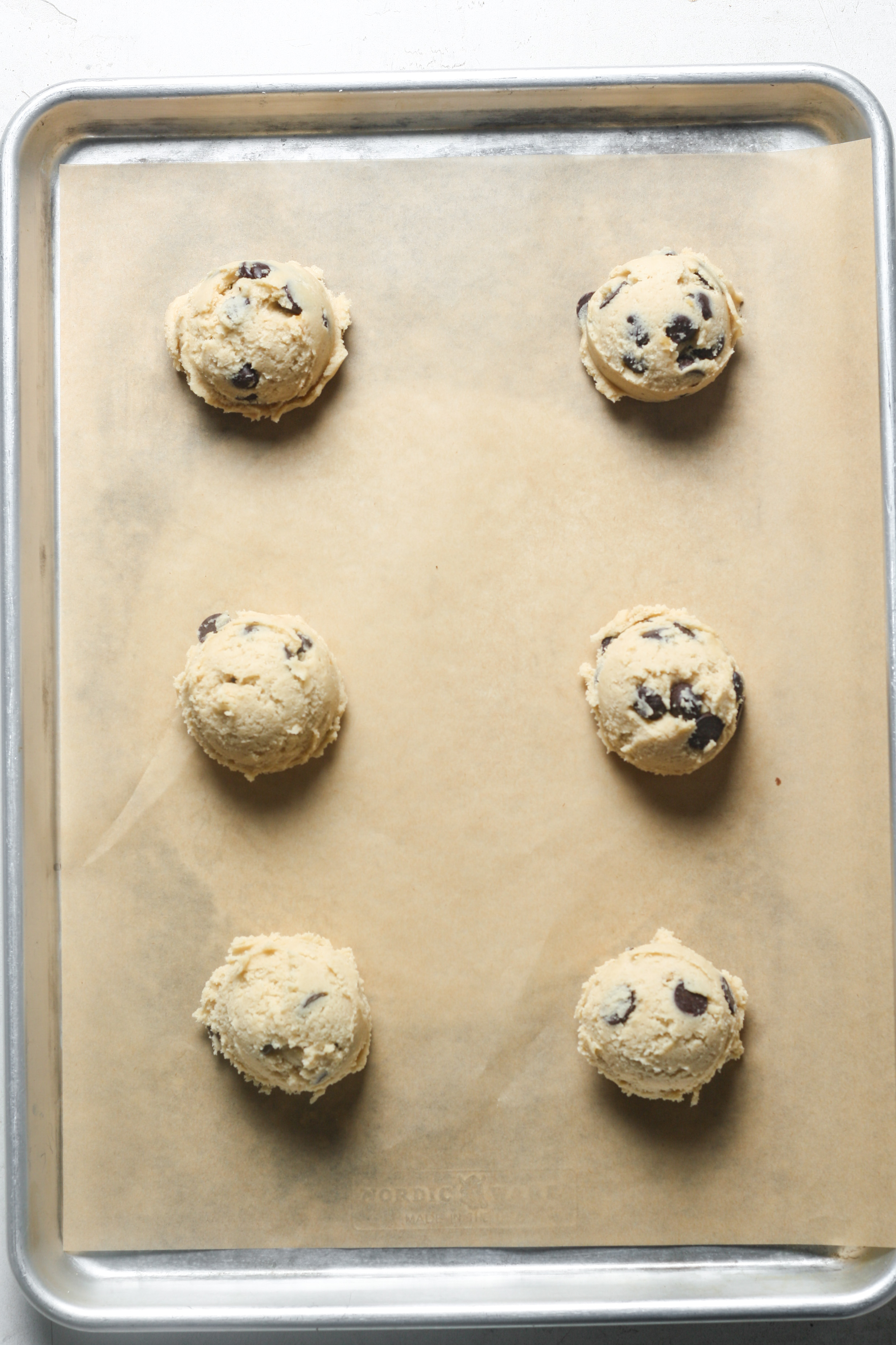 Dough balls on pan.