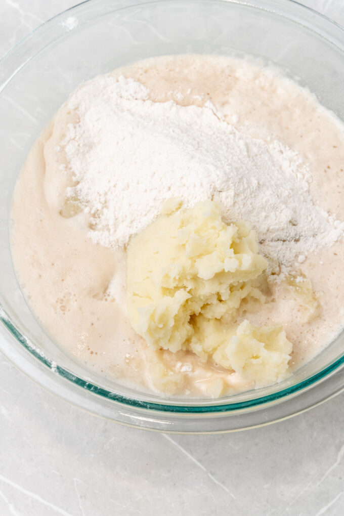 Mashed potatoes with flour in bowl.