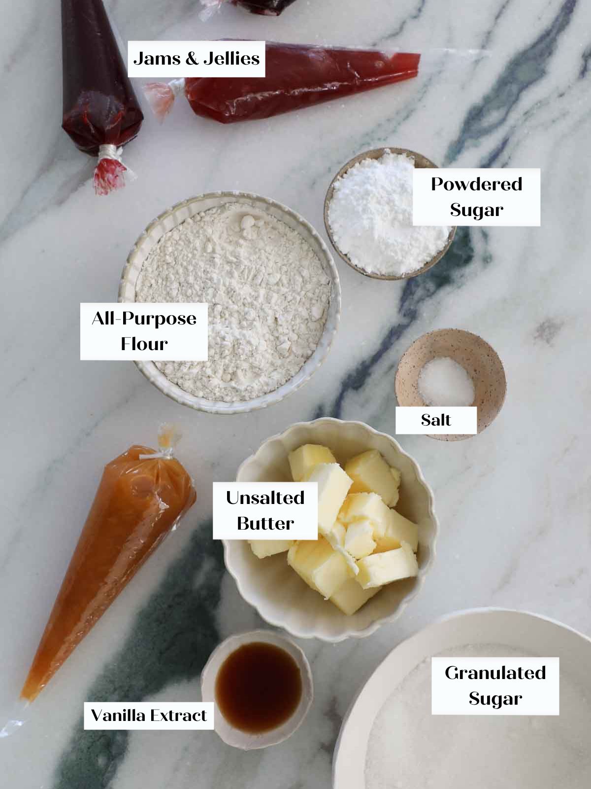 vanilla thumbprint ingredients on marble.