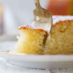 soft moist olive oil cake bite on fork.