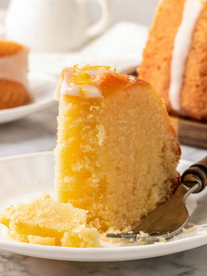 lemon bundt cake slice with fork dense texture.
