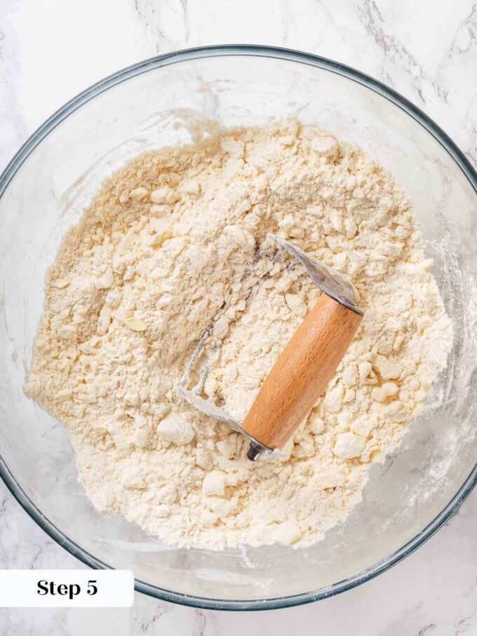 cutting butter and shortening into pie crust dough.
