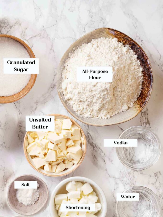 easy pie crust recipe with vodka butter shortening on marble. 