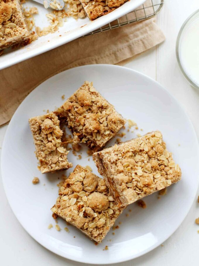 Thick and chewy carmelitas layered with buttery oats, caramel, and rich chocolate.
