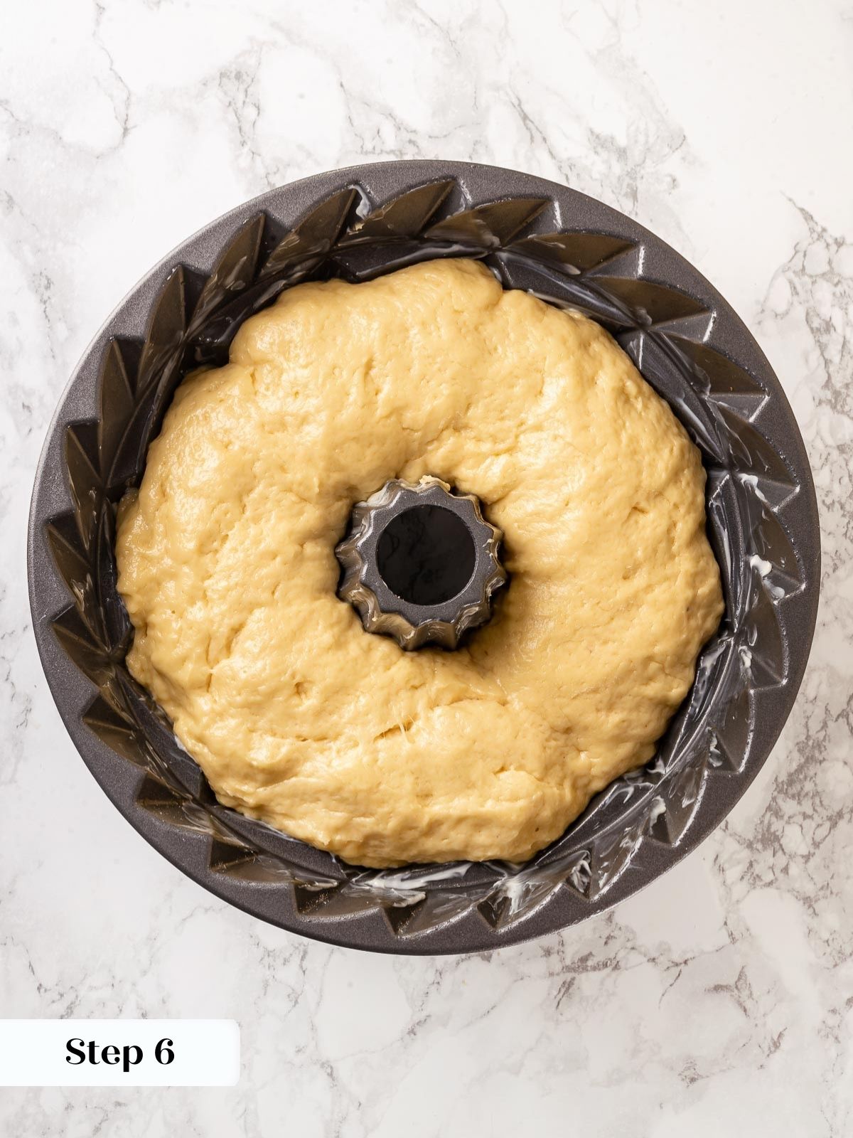 Bundt pan of proofed dough.