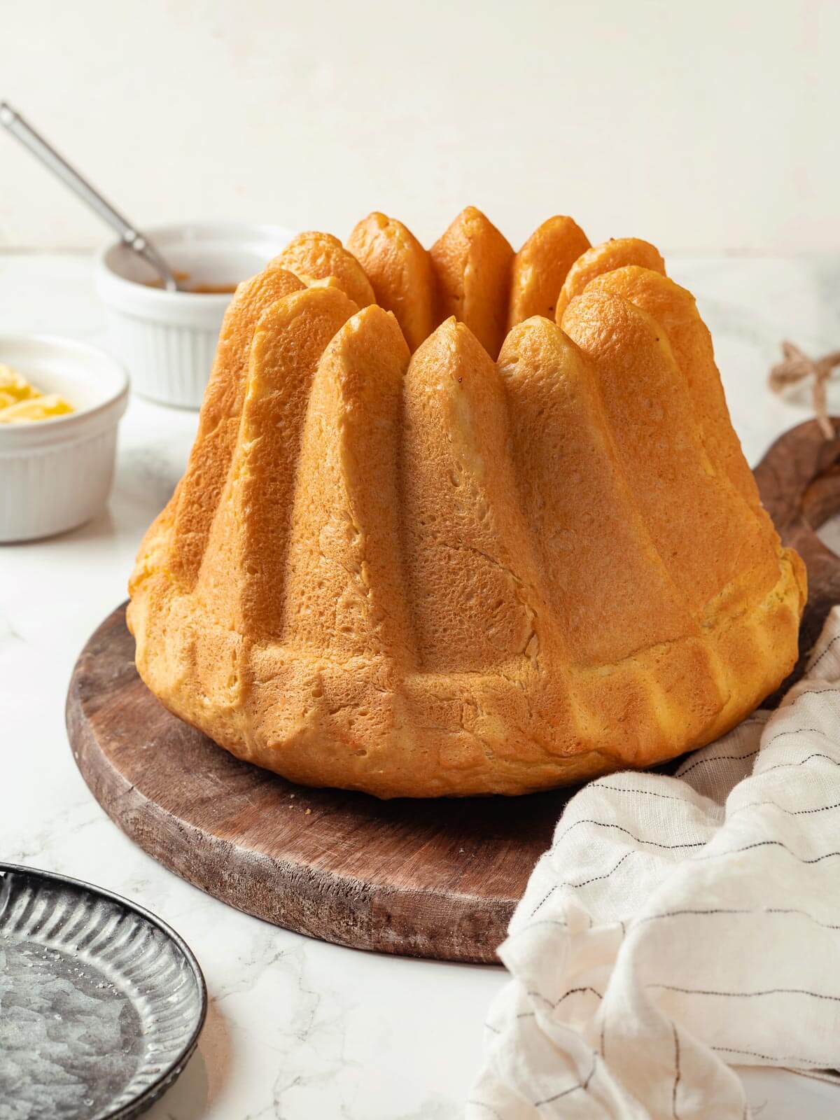 Bundt-shaped bread placed on a white background.