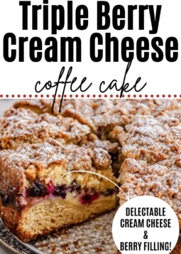 Cake plate holding sliced triple berry cream cheese coffee cake.