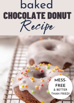 Chocolate cake donuts with a sugar glaze, made using sour cream and cake flour for softness.