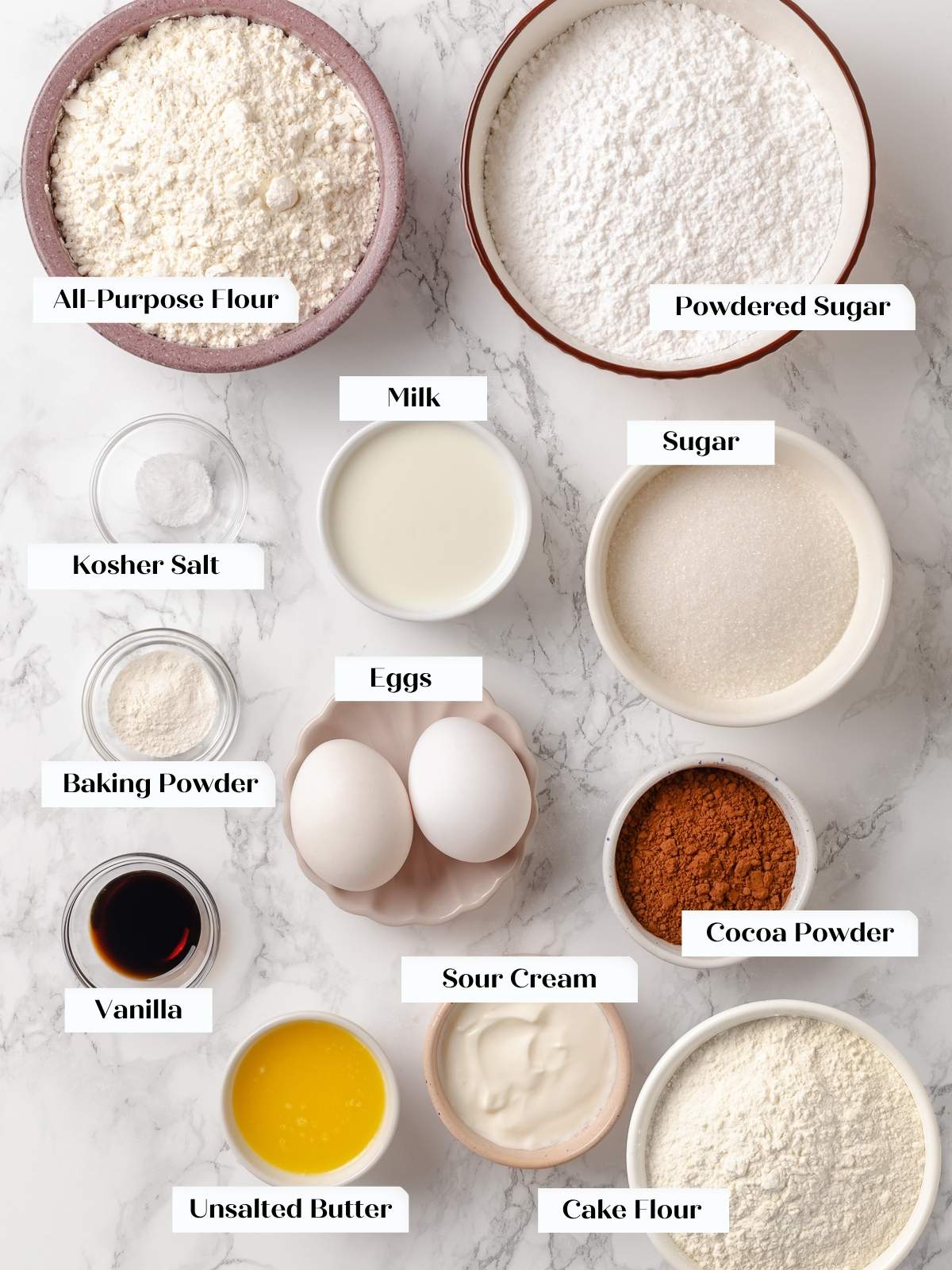 All ingredients for baked chocolate donuts are measured and arranged before mixing begins.