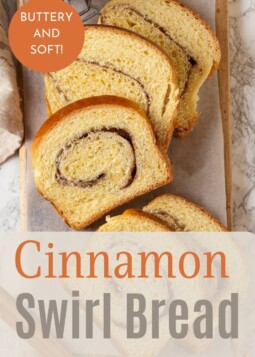 Fresh cinnamon sugar bread sliced, with soft insides and tight, even swirls throughout.