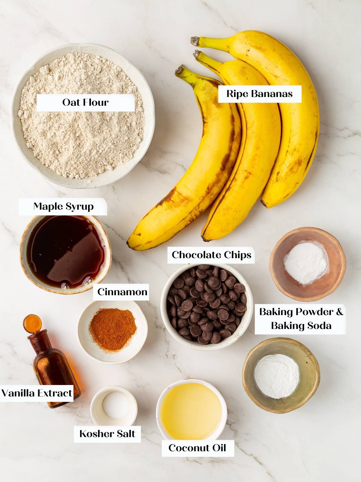 All ingredients for banana bread arranged on countertop before mixing begins.