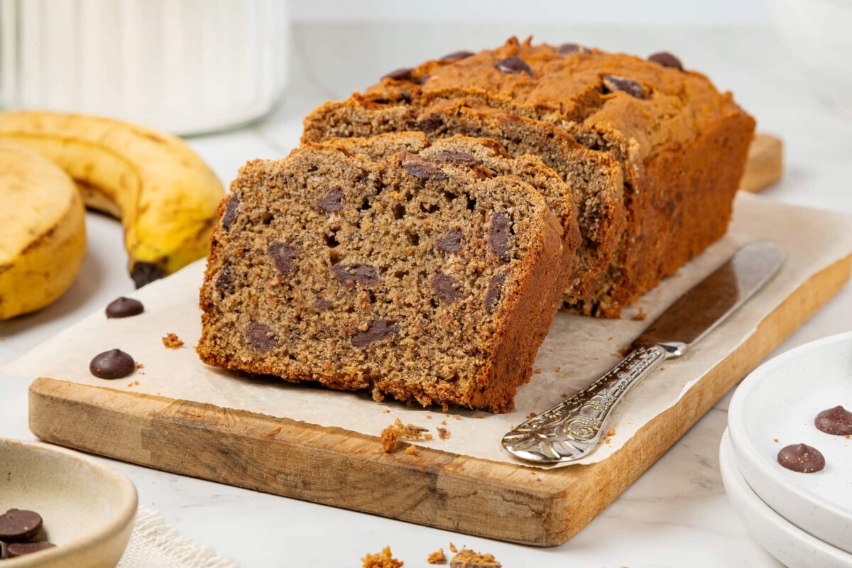 Inside texture of oat flour banana bread slice, showing tenderness and even crumb.