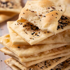 A cracker snapped to show hollow pockets and light interior from proper baking.