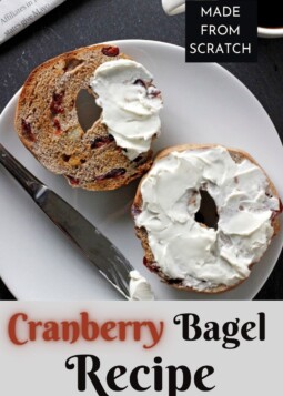 Whole wheat cranberry bagels sliced in half to show soft crumb and chewy texture inside each one.