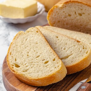 French bread slices fanned in a semicircle to show crumb and crust side by side.