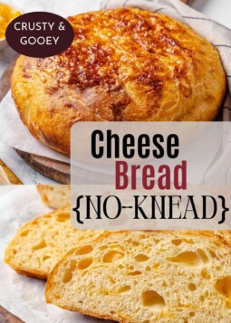 Thick slice of golden cheese bread resting on parchment with sharp cheddar melted on top.