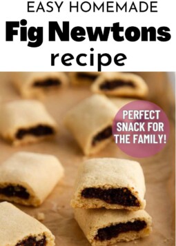 Fig Newton cookies arranged on parchment paper with smooth fig filling visible in each one.