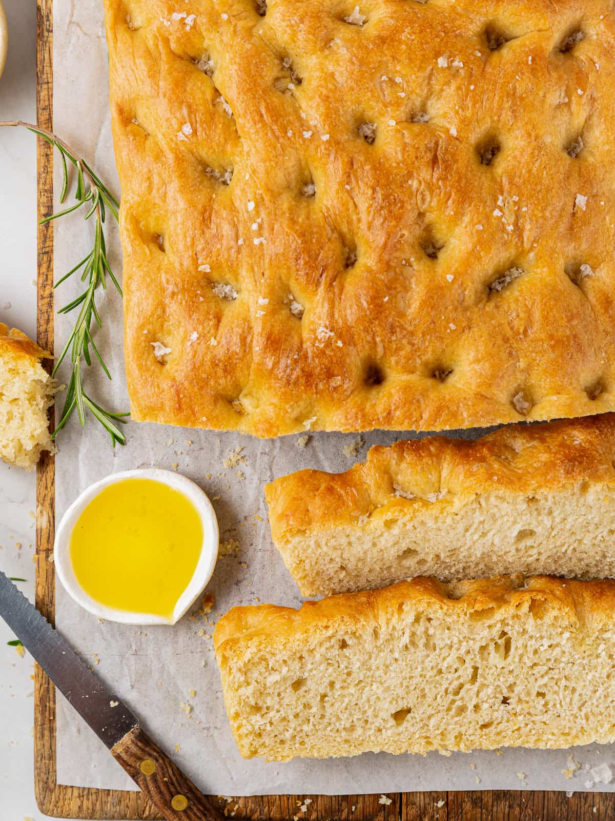 Golden-baked focaccia with crisp top crust and warm color from rich olive oil.