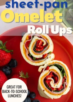 Two sheet-pan omelet roll-ups filled with spinach, red pepper, and ham on a red plate, and a callout that reads great for back-to-school lunches.