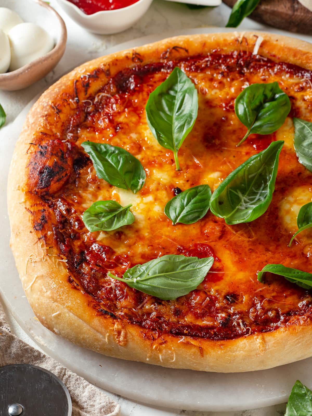 Freshly baked sourdough discard pizza with gooey melted mozzarella on golden crust.