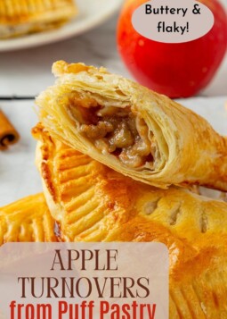 Warm apple turnovers with puff pastry stacked.