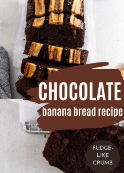 Freshly baked chocolate banana bread cooling on a counter with a kitchen towel nearby.