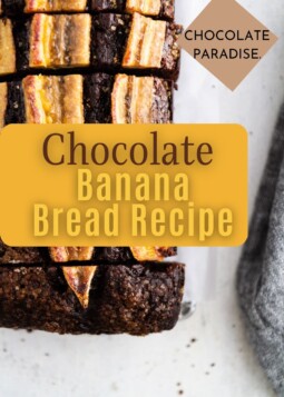 A moist loaf of chocolate banana bread cooling on a counter, ready for afternoon coffee.