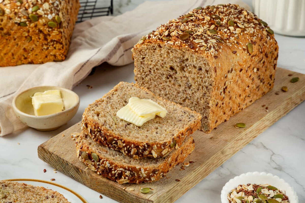 Loaf crust coated thickly with seeds, nutty and textured finish.