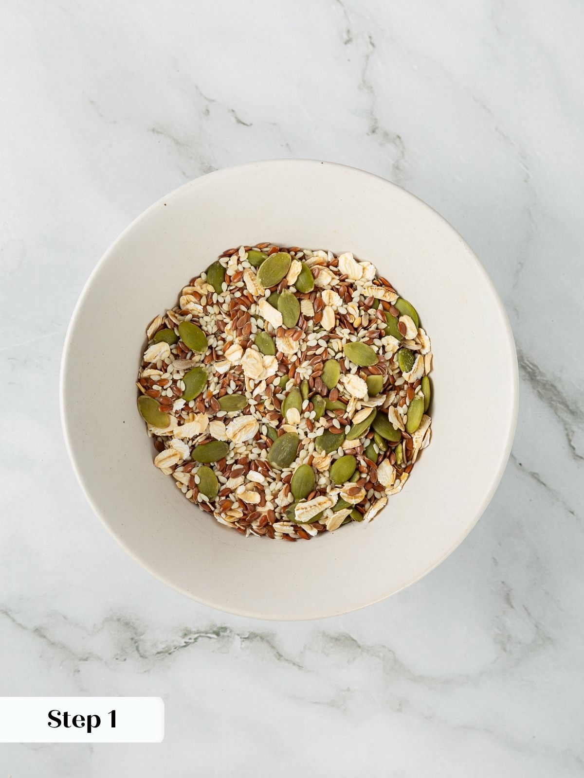 Mixture of pumpkin seeds, sunflower seeds, flax, and oats.