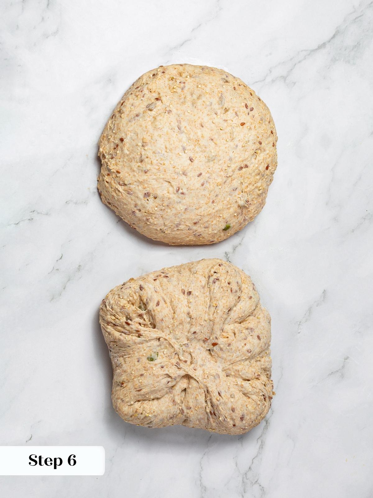Whole grain dough rounded for preshape before loaf shaping begins.