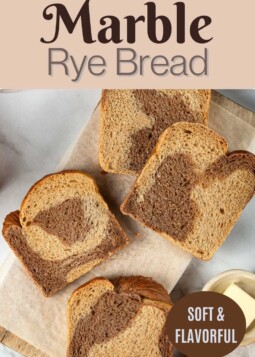 Soft slices of marble rye bread spread.