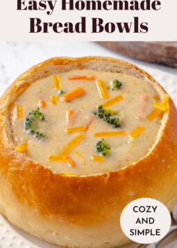 Bread bowls sliced open on top, showing the soft interior that holds thick comforting soups.