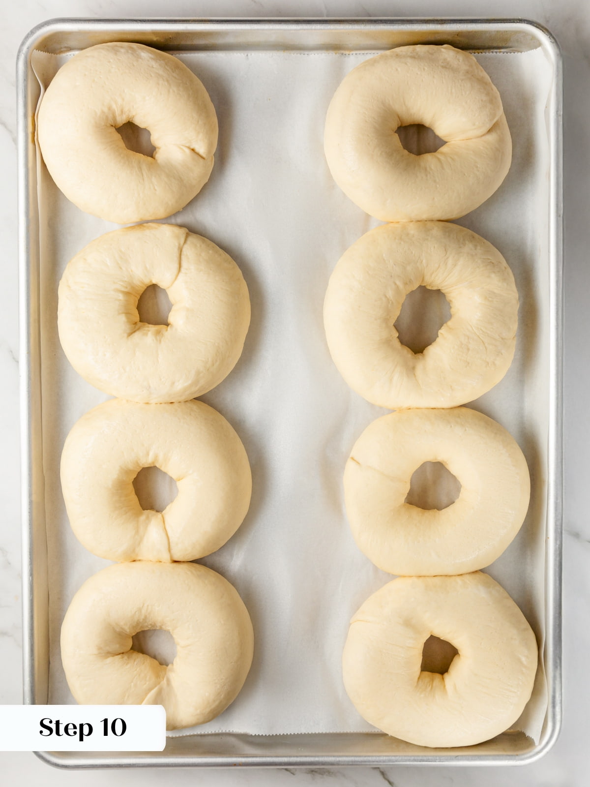 Dough resting during proofing stage showing increased lightness before baking steps.