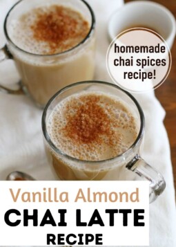Warm vanilla almond chai lattes topped with cinnamon in glass mugs.