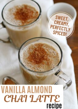 Warm vanilla almond chai lattes topped with cinnamon in glass mugs.